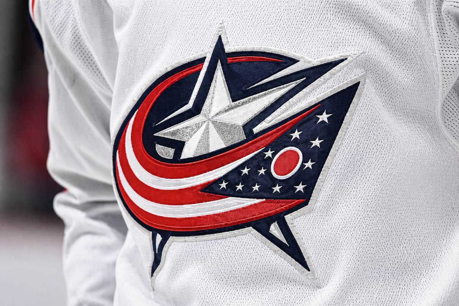 Charlie Coyle Columbus Blue Jackets center wearing navy jersey during 2025-26 season, representing The Last Center Standing UFA contract projection thesis April 2026