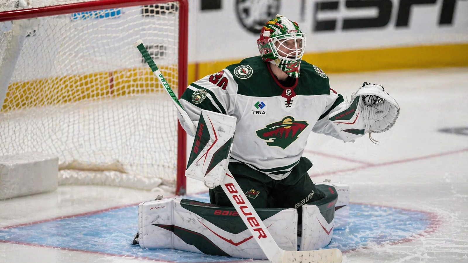 Jesper Wallstedt, Minnesota Wild goaltender, makes save during 2026 NHL playoff debut vs Dallas Stars